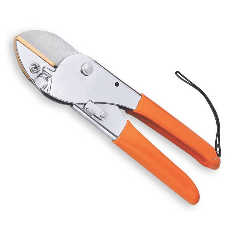 a pair of scissors with orange handles