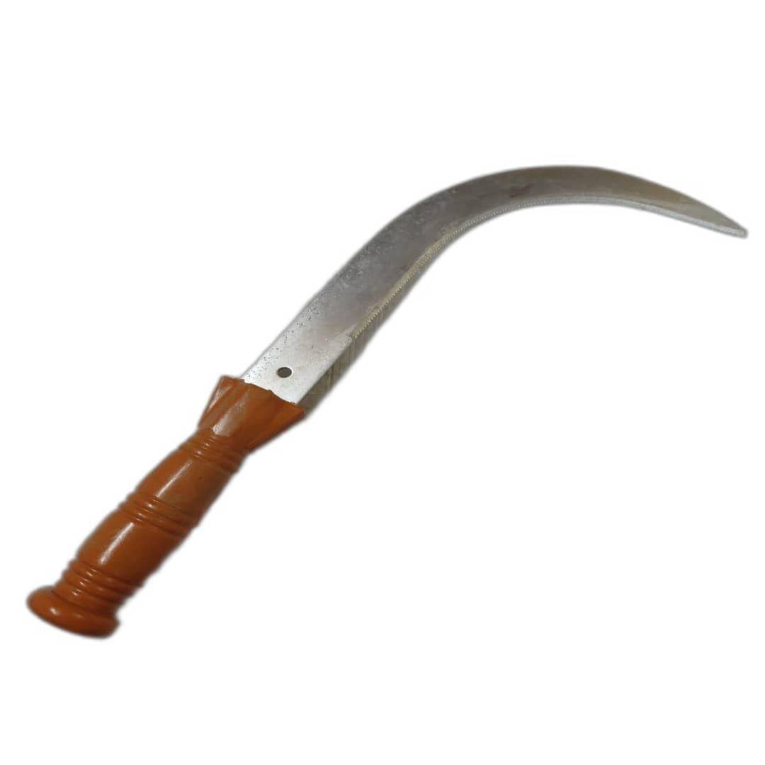 a curved knife with brown handle